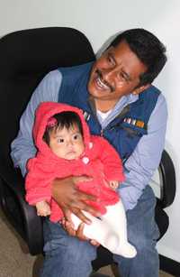 Alberto Patishtán with grandchild   