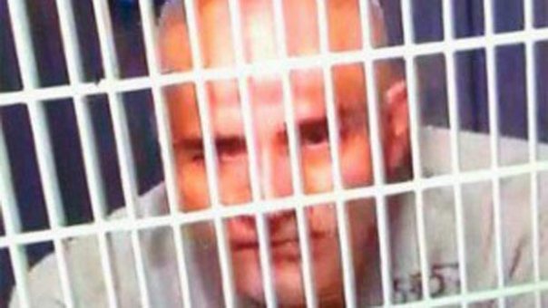 José Manuel Mireles behind bars with head shaved