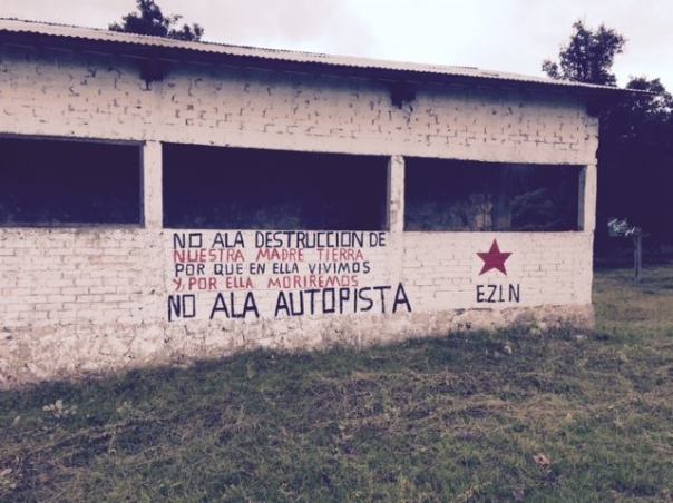 "No to the Super-Highway," painted on a building in Los Llanos Ejido.