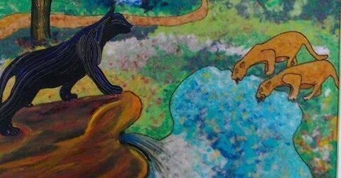 This painting was on display at the Festival in San Cristóbal: 2 Jaguars and a Black Panther.