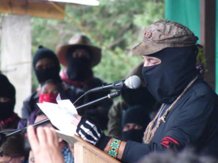 SupGaleano consulting his notes at the Seminar on Critical Thought versus the Capitalist Hydra