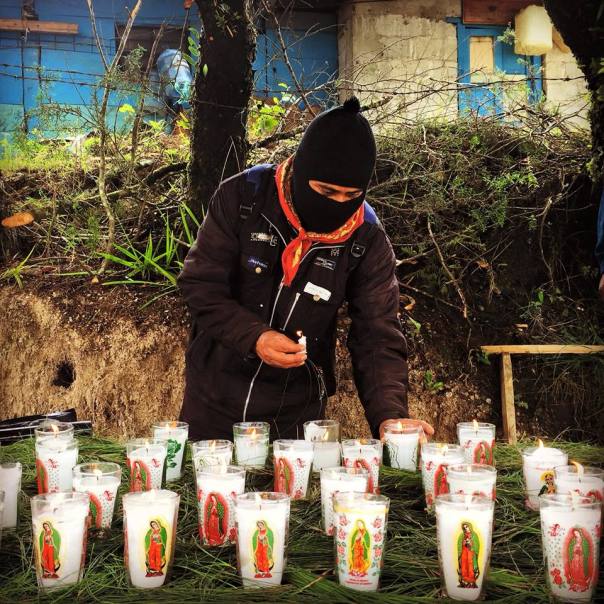 Indigenous Zapatistas give offerings and prayers asking for justice for the Ayotzinapa 43. Photo: Angeles Mariscal/Chiapas Paralelo