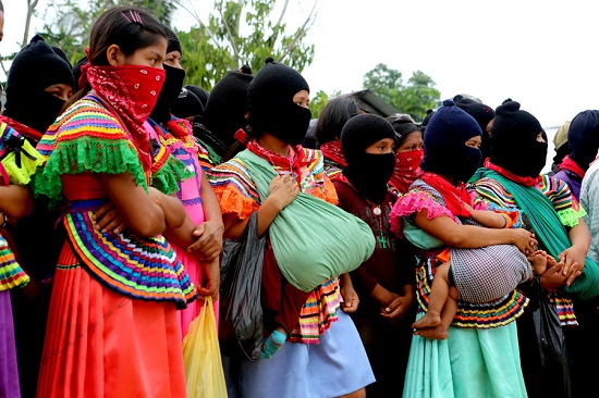 Zapatista youth and women form much of the current support base of the rebel organization.  They were in La Realidad during an homage to fallen compañero - Galeano - killed in a paramilitary attack against Zapatista members in La Realidad on May 2, 2014.  Thousands gathered in La Realidad to show there digna rabia, dignified rage, demand justice and an end to the on-going violence directed towards Zapatista indigenous communities in Chiapas.  The May 2nd attack was the first such attack directly in a Zapatista Caracol - Cultural Center of Resistance and Autonomous Governance.
