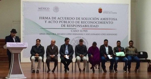 Pedro Faro, Director of Frayba (speaking), government officials and the victims (the 4 on the right) at the public apology.
