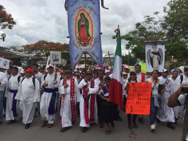 Religious leaders from the region of Los Bosques, at the front of the Pueblo Creyente (Believing People)