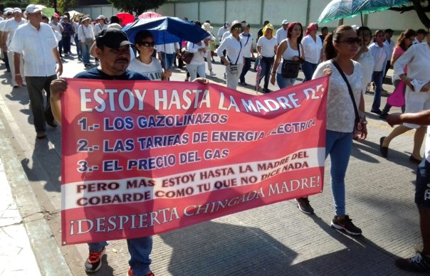 Banner in the Chiapas march: "We are fed up with: 1. the hike in fuel prices; 2. the cost of electricity; and 3. the price of gas. 