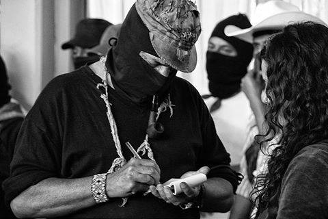 Galeano signing autographs.